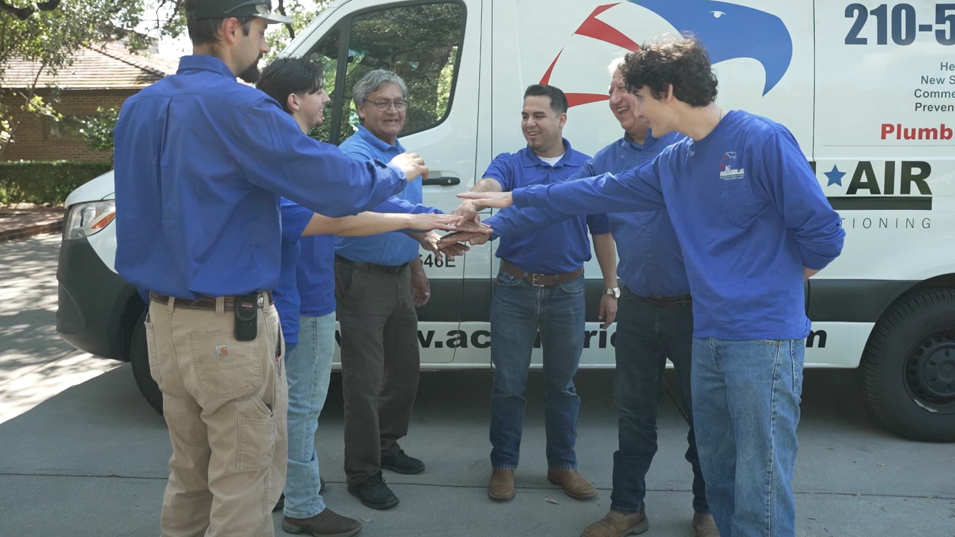 AC American Air HVAC Team on a Rooftop Service Call AC American Air HVAC team performing rooftop maintenance in San Antonio